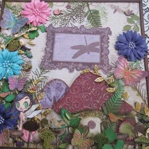 Layout by DT Member Laura Luyando using Diemond Dies Sunflower Set. Pine Branch Die, and Small and Large Monarch Butterfly Dies